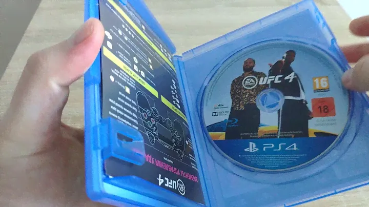 Распаковка игры UFC 4 для PS4 из Rozetka